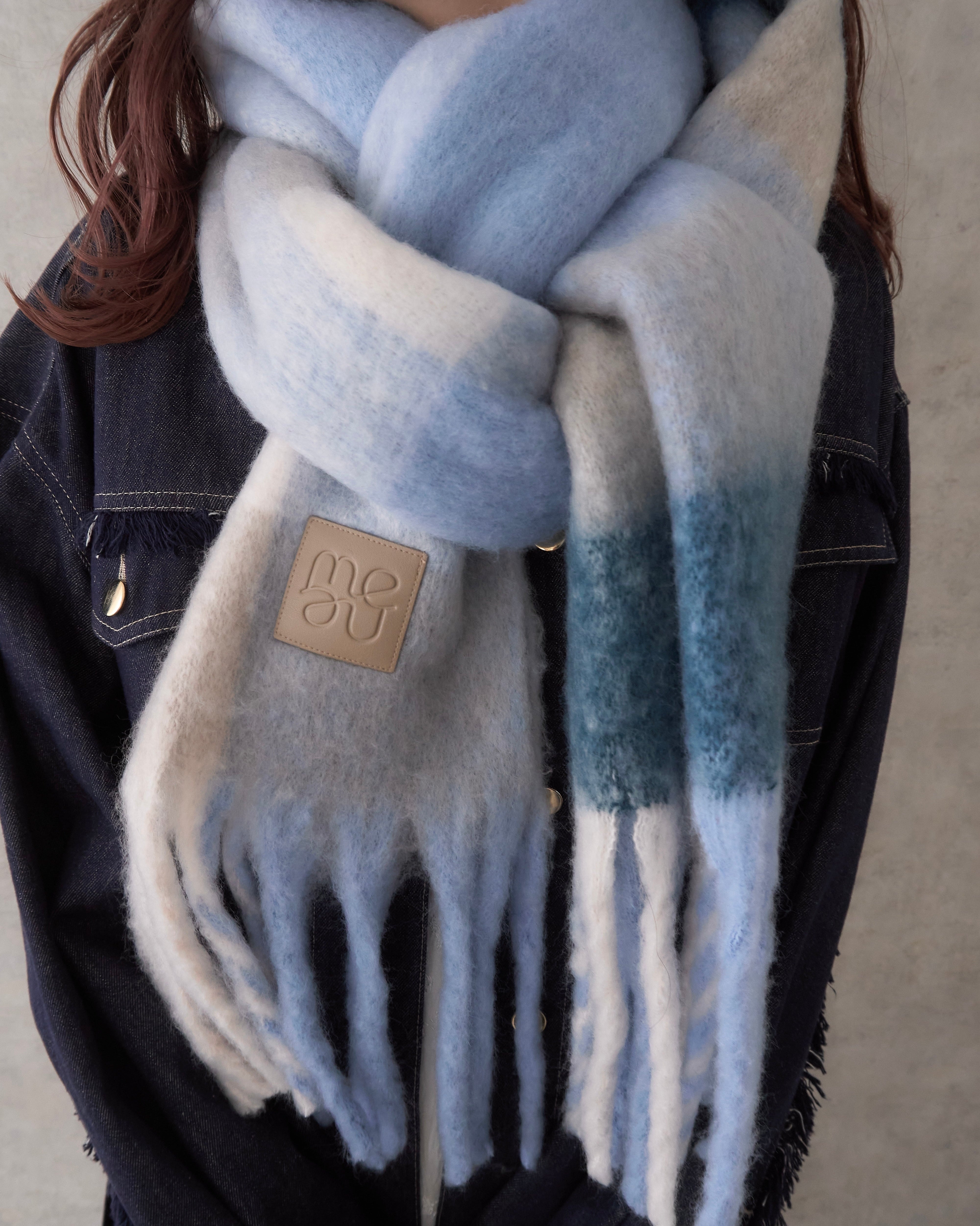 Volume block check muffler