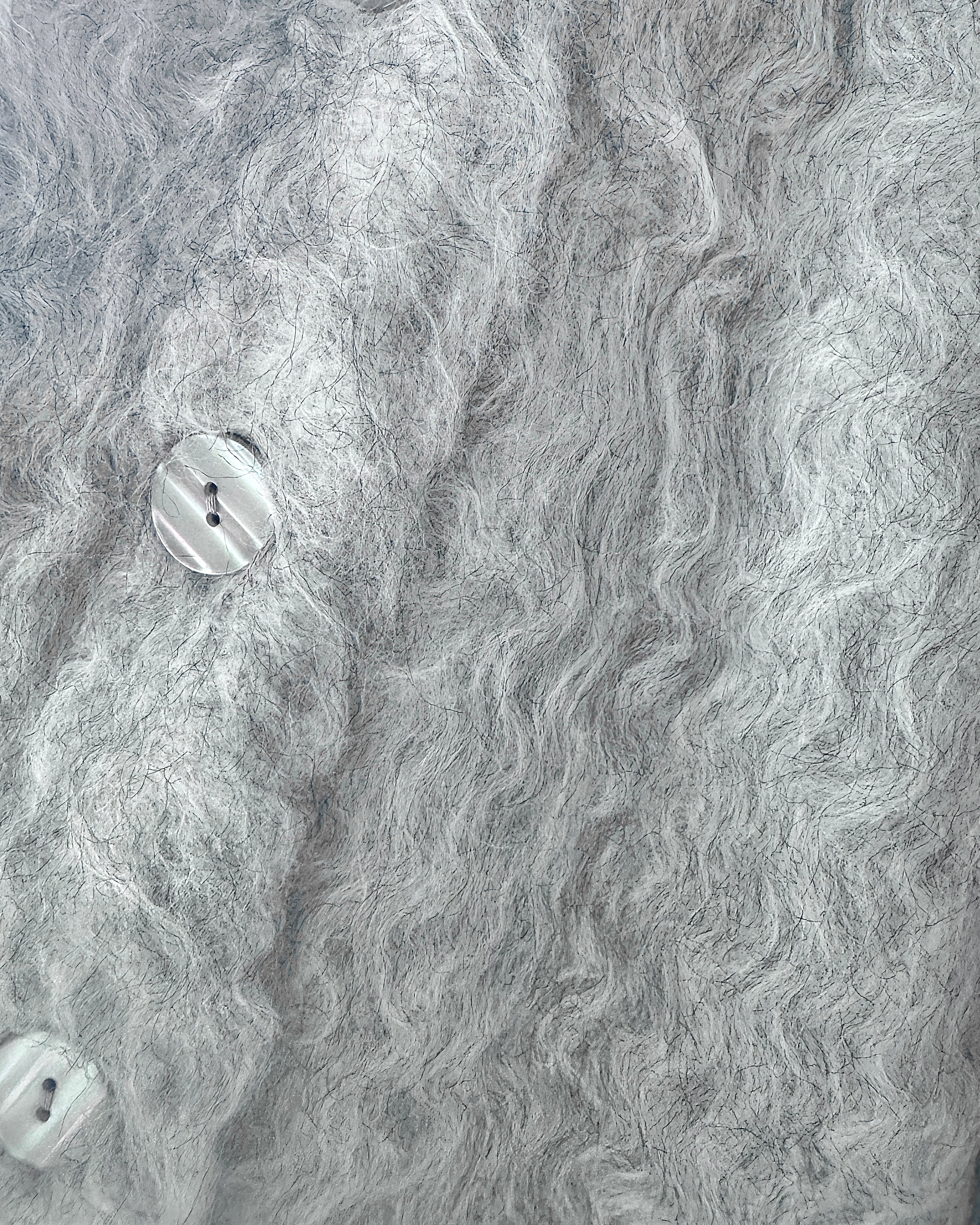 毛茸茸的针织长开衫