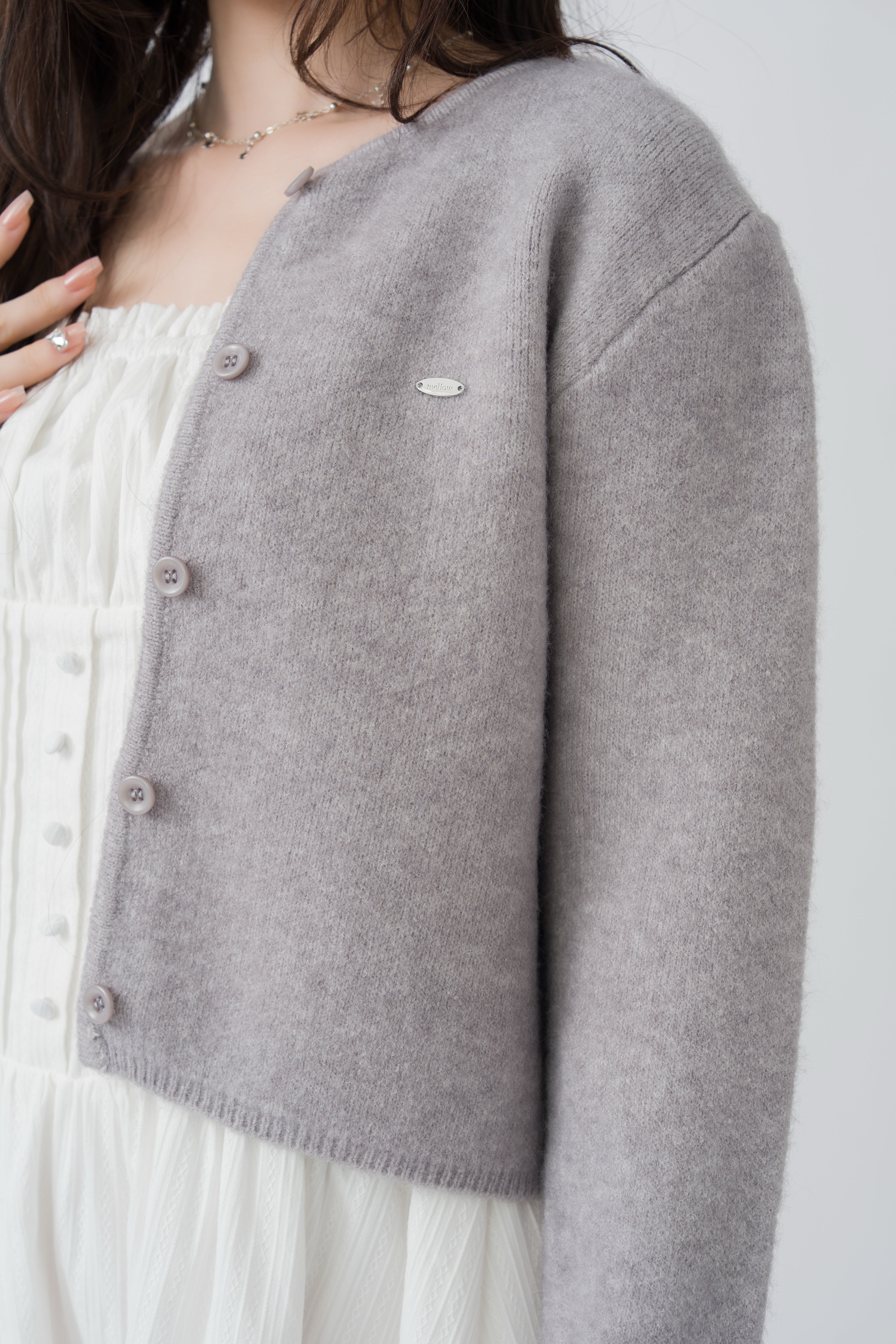 ロゴプレートニットカーディガン