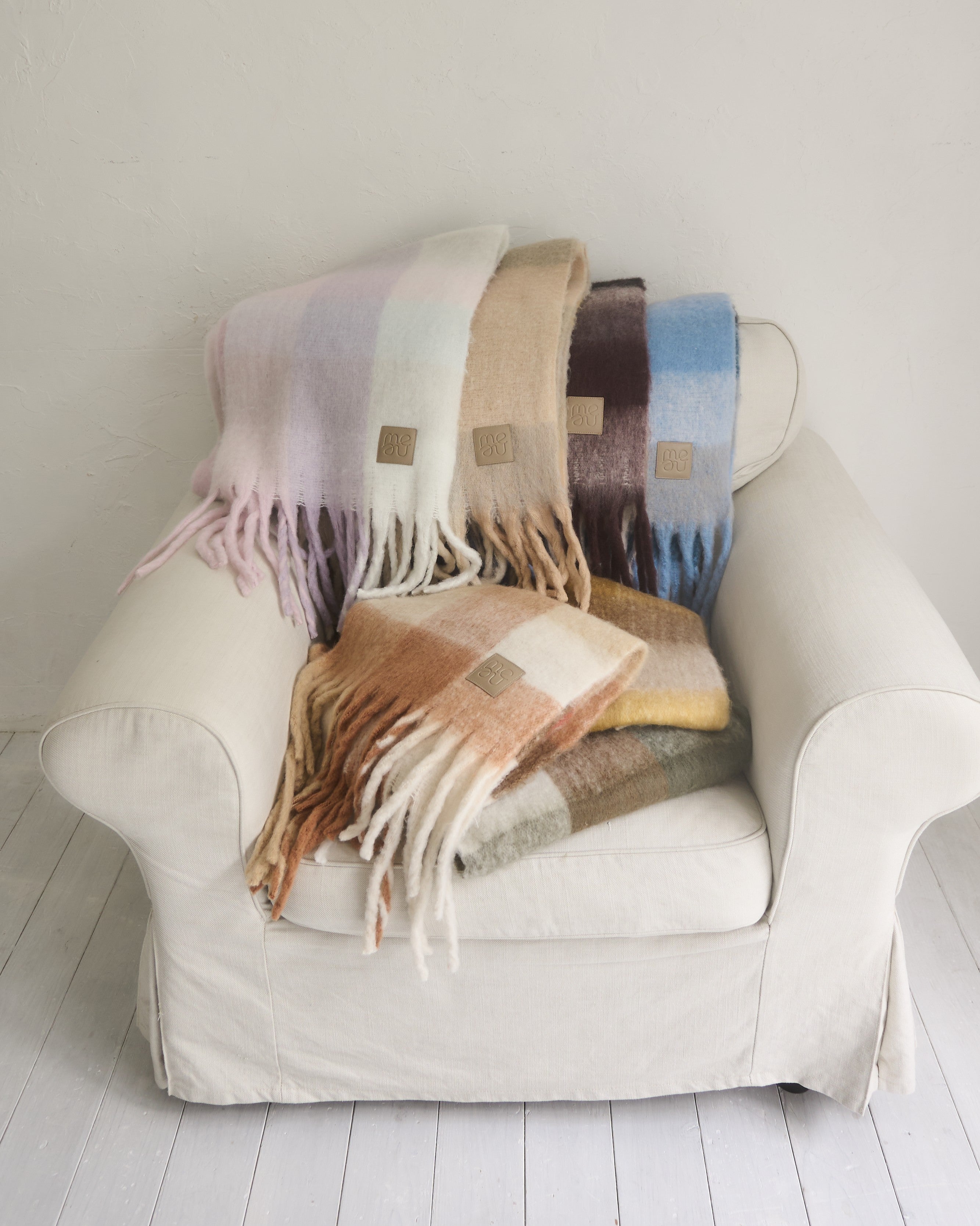 Volume block check muffler