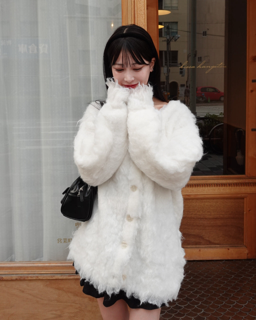 毛茸茸的针织长开衫